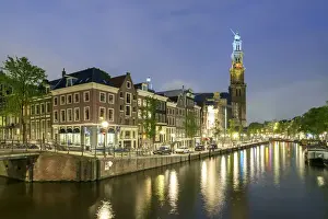 Intersection of Prinsengracht and Leidsegracht canals and tower of Westerkerk church