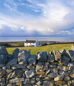 Ireland, Co. Donegal, Fanad, House and stone wall