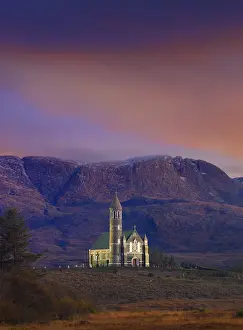 Ireland, Co. Donegal, Sacred heart church at Dunlewey illuminated at dusk