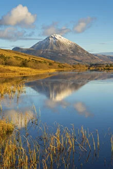 Images Dated 8th April 2021: Ireland, Co. Donegal, Snow capped Errigal mountain reflected in Clady river