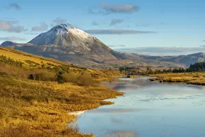 Ireland, Co. Donegal, Snow capped Errigal mountain and Clady river