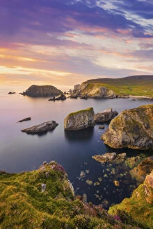 Images Dated 28th February 2022: Ireland, Co.Donegal, Port (An Port), Rocky coastline at dusk