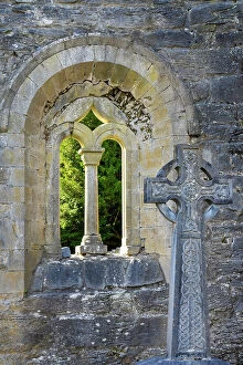 Images Dated 4th April 2023: Ireland, Co.Mayo, Cong, Cong Abbey, Celtic cross and arched window