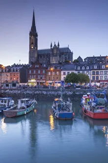 County Cork Prints: Ireland, County Cork, Cobh, St. Colmans Cathedral from Cobh Harbor, dusk