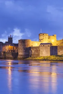 Ireland, County Limerick, Limerick City, King Johns Castle, 13th century, dusk