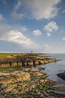 Ireland, County Wexford, Hook Peninsula, Hook Head, Hook Head LIghthouse, sunset