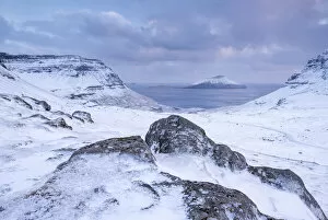 Images Dated 9th June 2020: The island of Koltur from the snow covered mountains of Streymoy, Faroe Islands, Denmark