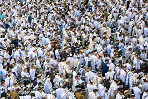 Israel, Jerusalem District, Jerusalem. Jews praying at the Western Wall fill the Kotel