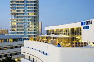 Tel Aviv Prints: Israel, Tel Aviv-Yafo, Tel Aviv. Historic Hotel Cinema on Diezengoff Square at dusk