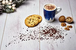 Images Dated 12th September 2017: Italian cappuccino with cookies and walnuts on a white wooden table