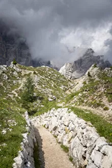 Italian Dolomites, 1st world war tracks, cloudy sky. Veneto, Italy