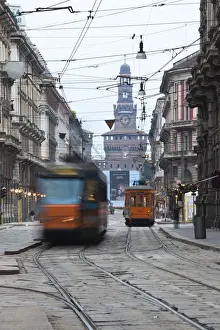 Trams Prints: Italy, Lombardy, Milan, Milan trams on Via Orefici with Castello Sforzesco, dawn