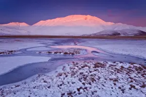 Marche Prints: Italy, Marche, Fantastic sunset at -18 a on the plain of Castelluccio di Norcia