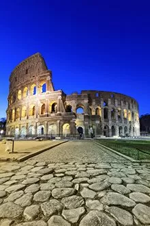 Images Dated 31st March 2016: Italy, Rome, Colosseum and Roman Forum by night