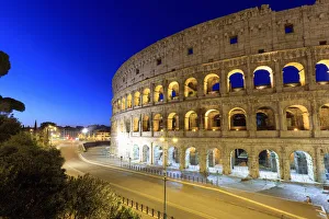 Italy, Rome, Colosseum and Roman Forum by night