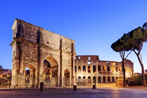 Italy, Rome, Colosseum and Roman Forum by night