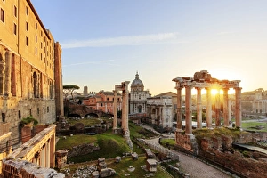 Images Dated 31st March 2016: Italy, Rome, Colosseum and Roman Forum at sunrise