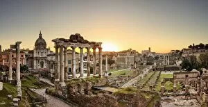 Images Dated 31st March 2016: Italy, Rome, Colosseum and Roman Forum at sunrise