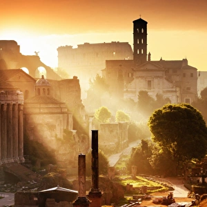 Images Dated 8th April 2017: Italy, Rome, Colosseum and Roman Forum at sunrise