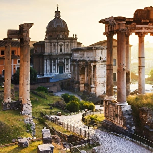 Images Dated 15th April 2017: Italy, Rome, Colosseum and Roman Forum at sunrise