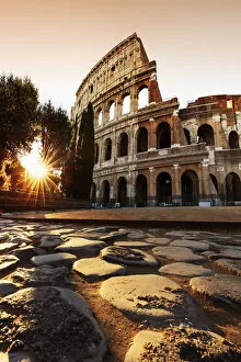 Images Dated 31st May 2017: Italy, Rome, Colosseum and Roman Forum at sunrise