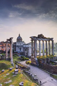 Italy, Rome, Colosseum and Roman Forum at sunrise