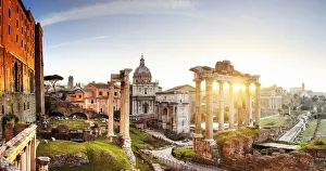 Italy, Rome, Colosseum and Roman Forum at sunrise