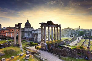 Italy, Rome, Colosseum and Roman Forum at sunrise