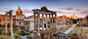 Italy, Rome, Colosseum and Roman Forum at sunset