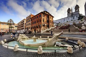 Italy, Rome, TrinitAA┬á dei Monti stairs and Barcaccia fountain at Spain square at sunrise