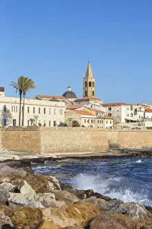 Italy, Sardinia, Alghero, View of ancient city walls and the historical center