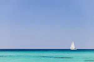 Italy, Sardinia, Olbia-Tempo, Berchidda. A sailing boat out at sea