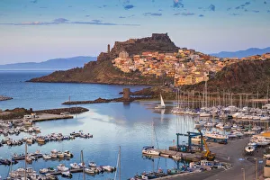Italy, Sardinia, Sassari Province, Castelsardo, View over marina towards the ancient