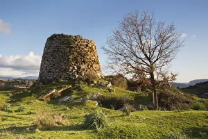 Italy, Sardinia, Typical Sardinian Nuraghe taken at sunset in the Barbagia of Seulo
