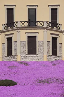 Italy, Sardinia, Western Sardinia, Alghero, beachside villa and flowers