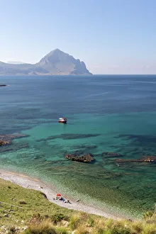 Italy, Sicily, Trapani, Macari bay, Golfo di Macari, a boat moors off the beach