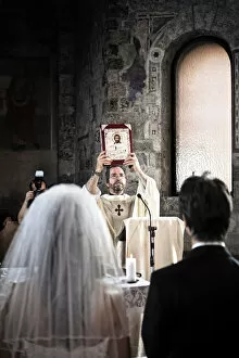 Italy, Umbria, catholic priest during the wedding liturgy