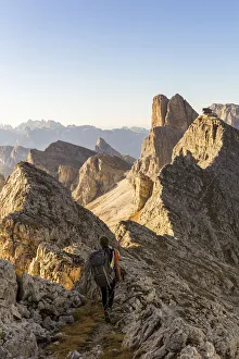 Ra Gusela Prints: Italy, Veneto, Belluno district, mount Ra Gusela, a man along the mountain path (MR)