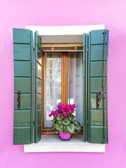 Italy, Veneto, Venice, Burano. Typical window on a colorful house