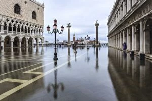 Acqua Alta Gallery: Italy, Veneto, Venice. High water on San Marco Square with Palazzo Ducale on the left