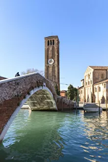 Italy, Veneto, Venice, Murano island. Bridge and Duomo dei Santi Maria e Donato church