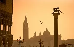 Northern Italy Collection: Italy, Veneto, Venice; The Palazzo dei Dogi, the bacino di San Marco with a sculpture of the lion
