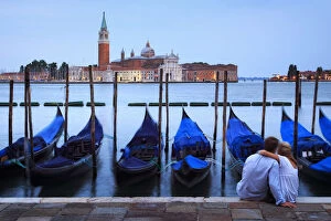 St Marks Square Gallery: Italy, Veneto, Venice, Sestier of San Marco, Moored gondolas with San Giorgio Maggiore