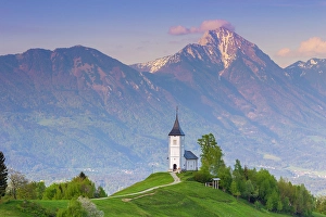 Skofja Loka Prints: Jamnik church, with Mount Triglav on the background