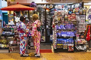 Shopping Prints: Japan, Honshu, Tokyo, Asakusa, Two Woman Dressed in Kimono in front of Souvenir Shop