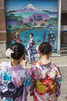 Girls Prints: Japan, Honshu, Tokyo, Asakusa, Young Women in Kimono Taking Photos in Front of Shop