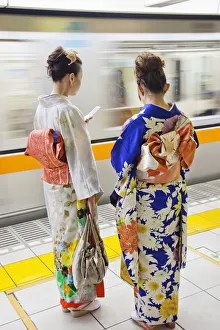 Two People Prints: Japan, Tokyo, Girls in Kimono on Subway Platform