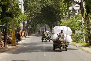 Goods Prints: Jessore, Bangladesh. The main route into Jessore is busy with crops being transported