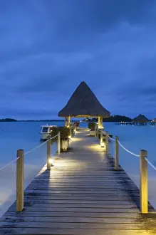 Leeward Islands Prints: Jetty of Intercontinental Bora Bora Le Moana Resort at dusk, Bora Bora, Society Islands