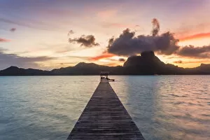 Images Dated 30th September 2015: Jetty at sunset, Bora Bora, French Polynesia